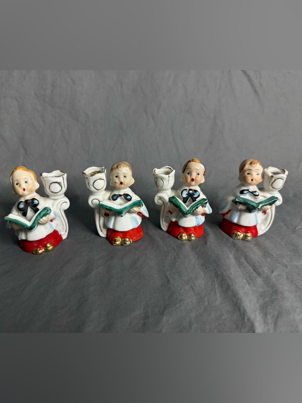 Set of 4 Vintage 1950’s Ceramic Choir Boy Candle Holders in White, Red and Gold